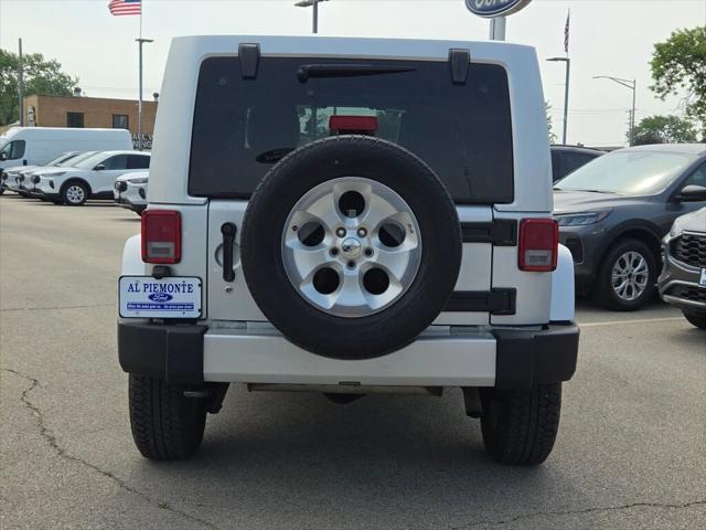used 2011 Jeep Wrangler Unlimited car, priced at $9,000
