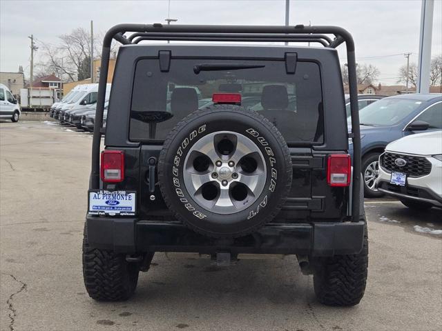 used 2016 Jeep Wrangler Unlimited car, priced at $22,977