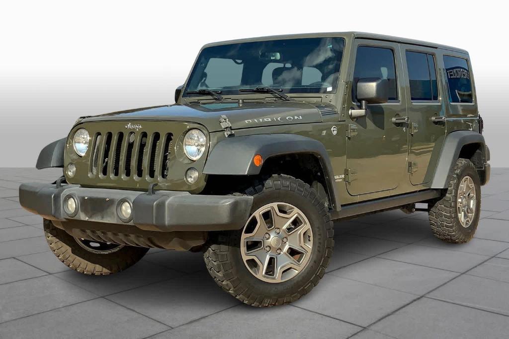 used 2015 Jeep Wrangler Unlimited car, priced at $24,776