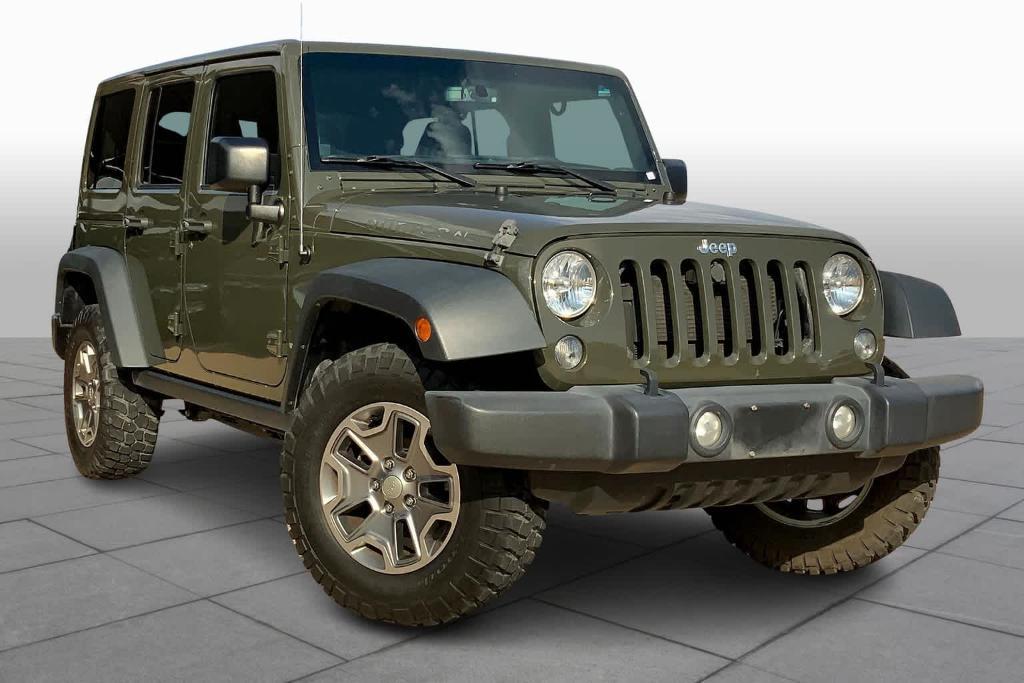 used 2015 Jeep Wrangler Unlimited car, priced at $24,776