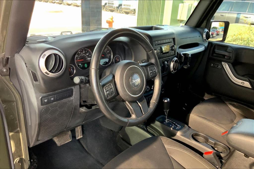 used 2015 Jeep Wrangler Unlimited car, priced at $24,776