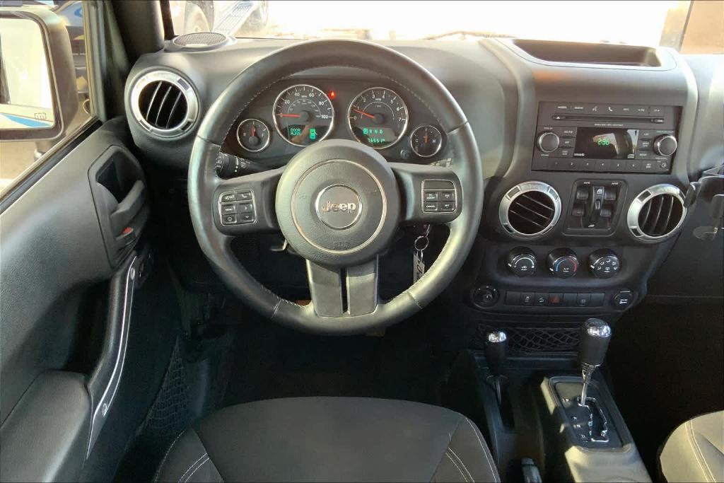 used 2015 Jeep Wrangler Unlimited car, priced at $24,776