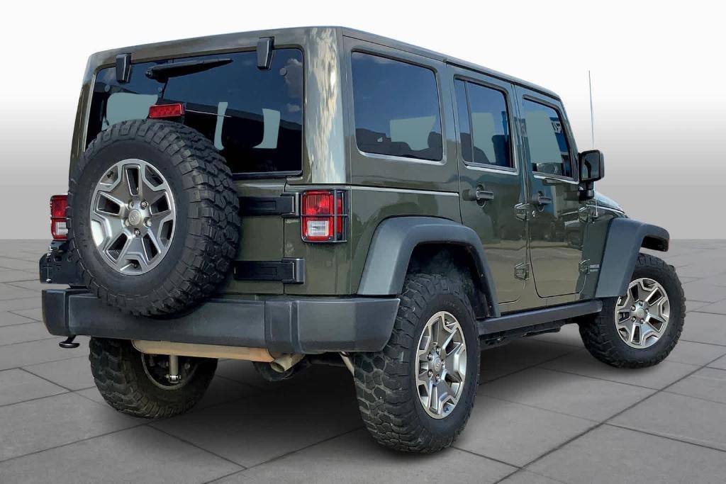 used 2015 Jeep Wrangler Unlimited car, priced at $24,776