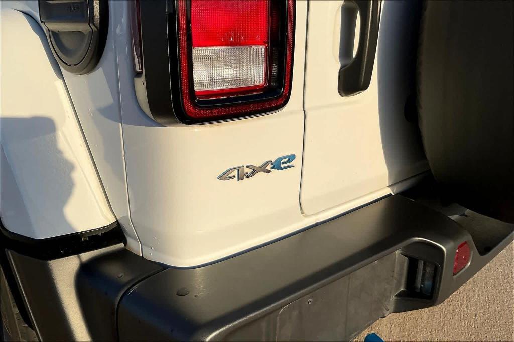 used 2024 Jeep Wrangler 4xe car, priced at $37,236