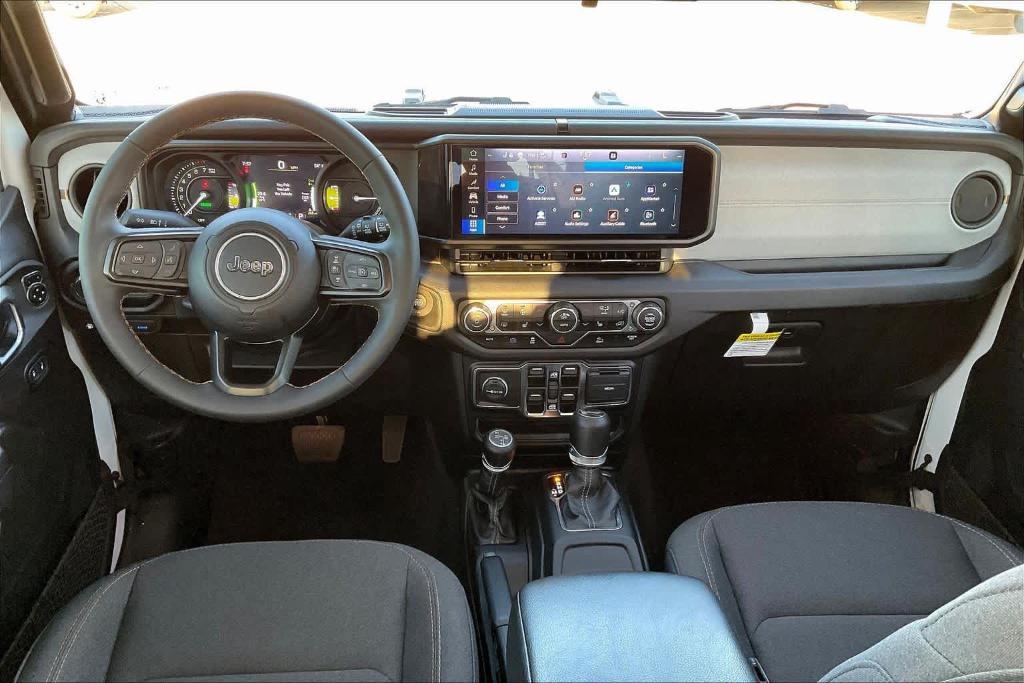 used 2024 Jeep Wrangler 4xe car, priced at $37,236