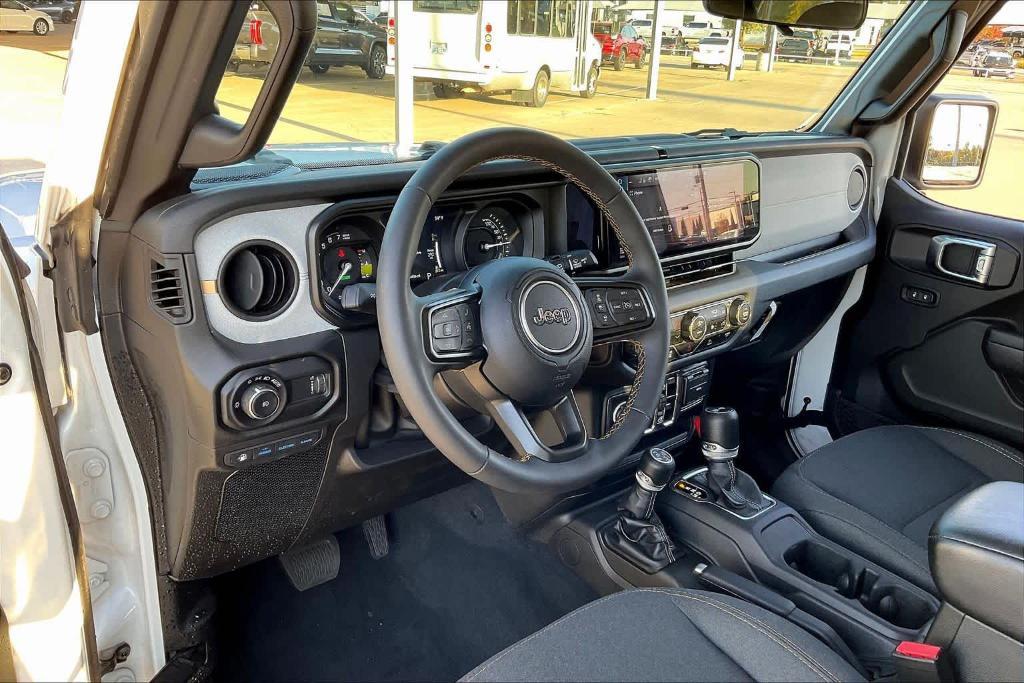 used 2024 Jeep Wrangler 4xe car, priced at $37,236