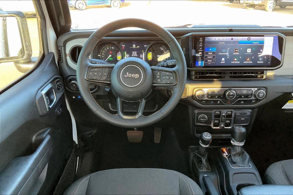 used 2024 Jeep Wrangler 4xe car, priced at $37,236