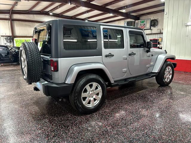 used 2013 Jeep Wrangler Unlimited car, priced at $19,988