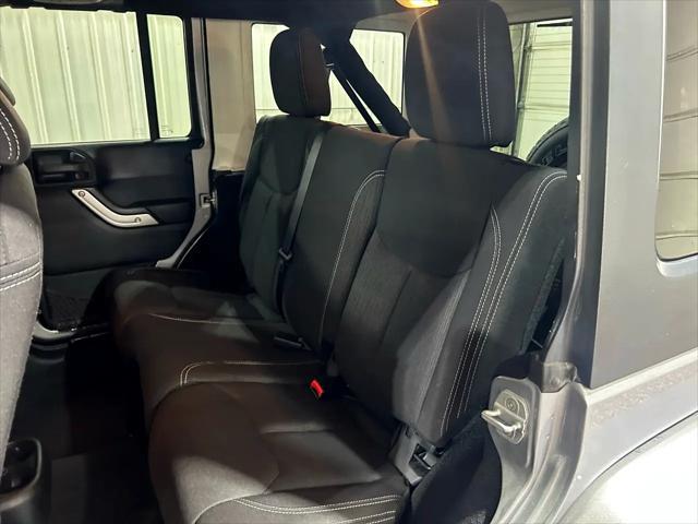 used 2013 Jeep Wrangler Unlimited car, priced at $19,988
