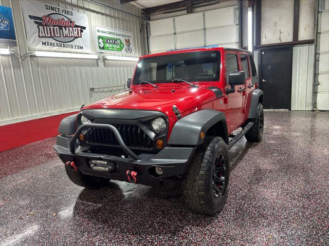 used 2010 Jeep Wrangler Unlimited car, priced at $13,490