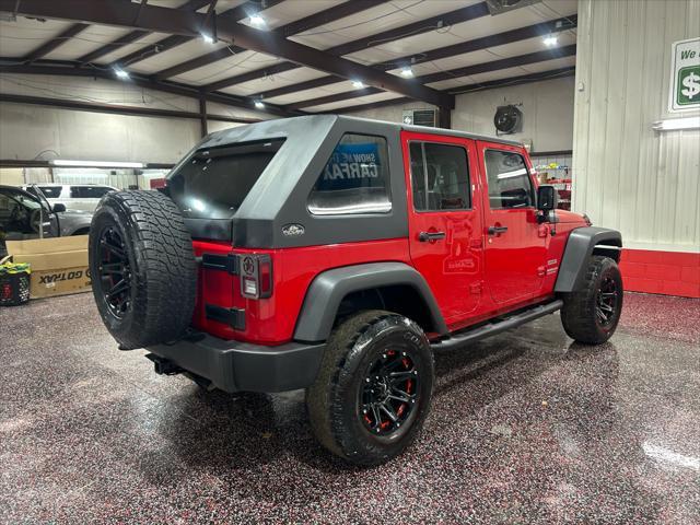 used 2010 Jeep Wrangler Unlimited car, priced at $13,490