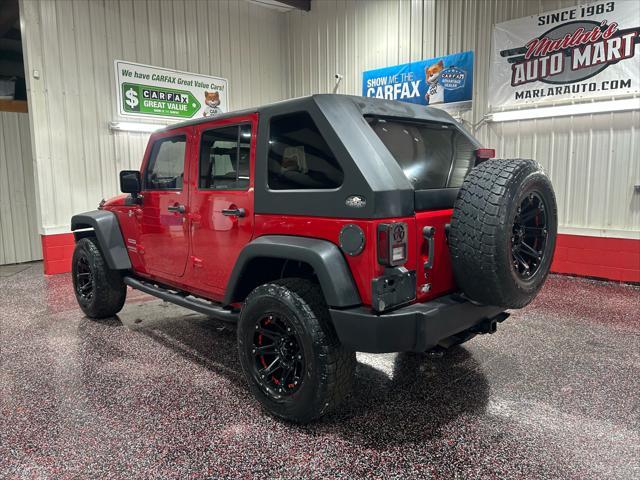 used 2010 Jeep Wrangler Unlimited car, priced at $13,490