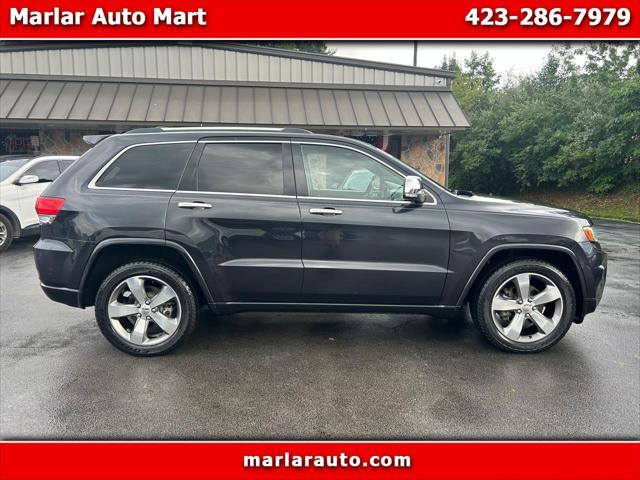 used 2014 Jeep Grand Cherokee car, priced at $12,990