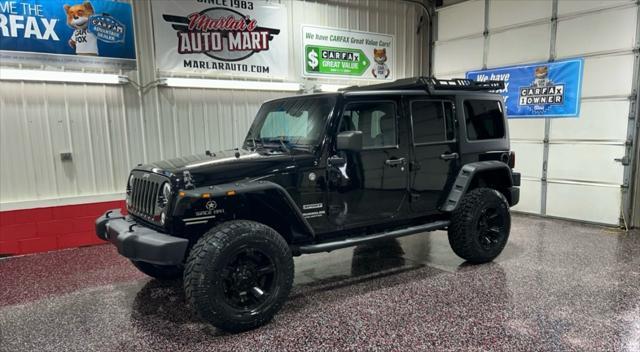 used 2014 Jeep Wrangler Unlimited car, priced at $14,990