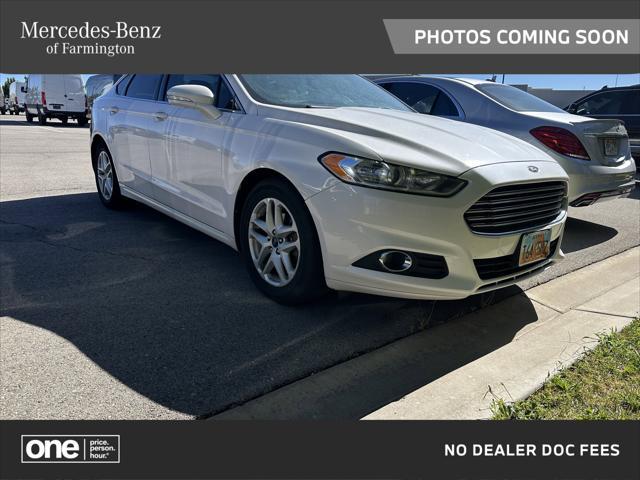 used 2014 Ford Fusion car, priced at $7,800