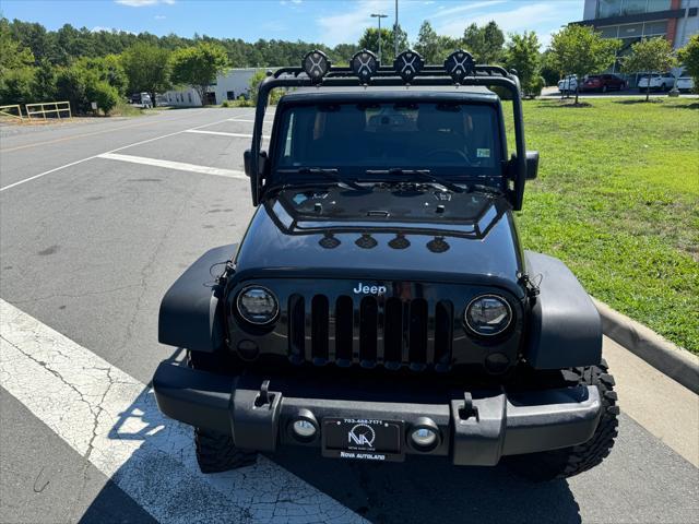 used 2013 Jeep Wrangler Unlimited car, priced at $12,498