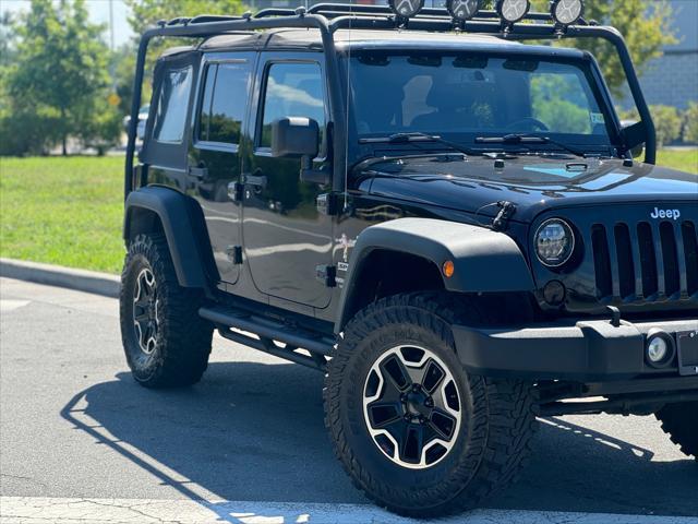 used 2013 Jeep Wrangler Unlimited car, priced at $12,498