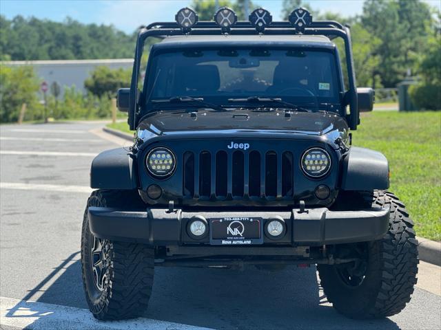 used 2013 Jeep Wrangler Unlimited car, priced at $12,498