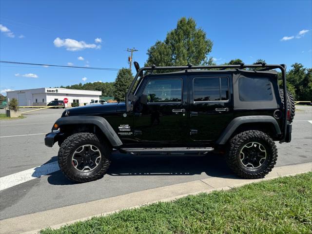 used 2013 Jeep Wrangler Unlimited car, priced at $12,498