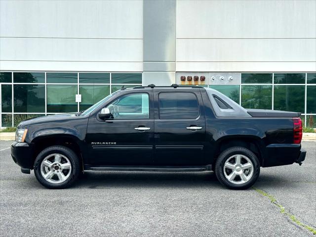 used 2011 Chevrolet Avalanche car, priced at $11,995