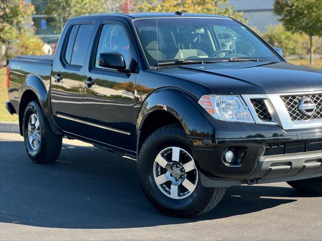 used 2013 Nissan Frontier car, priced at $14,995