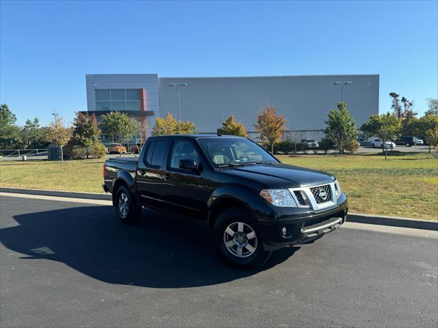 used 2013 Nissan Frontier car, priced at $14,995