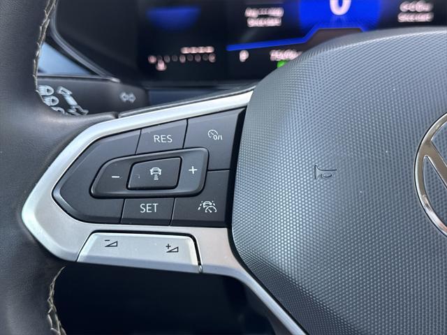 used 2023 Volkswagen Taos car, priced at $19,900