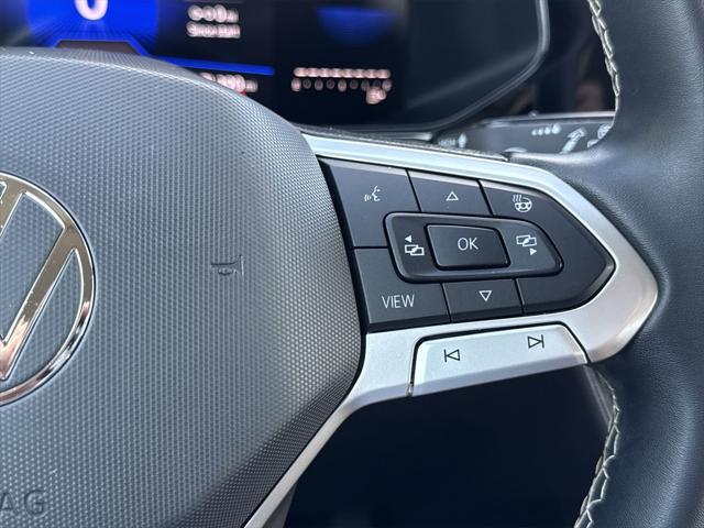 used 2023 Volkswagen Taos car, priced at $19,900