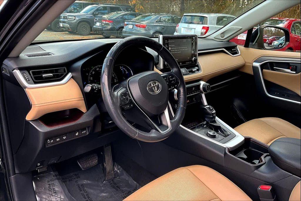 used 2020 Toyota RAV4 Hybrid car, priced at $27,703
