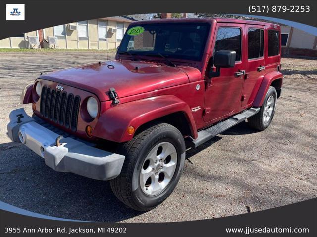 used 2013 Jeep Wrangler Unlimited car, priced at $16,990