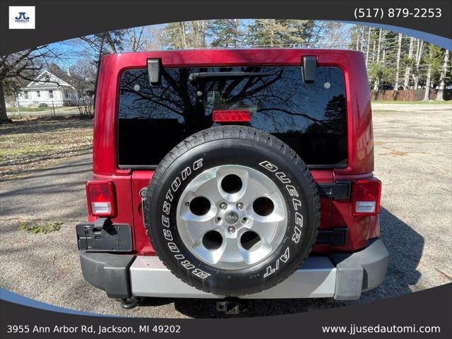 used 2013 Jeep Wrangler Unlimited car, priced at $16,990