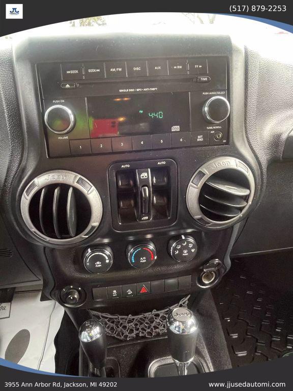used 2012 Jeep Wrangler Unlimited car, priced at $13,990