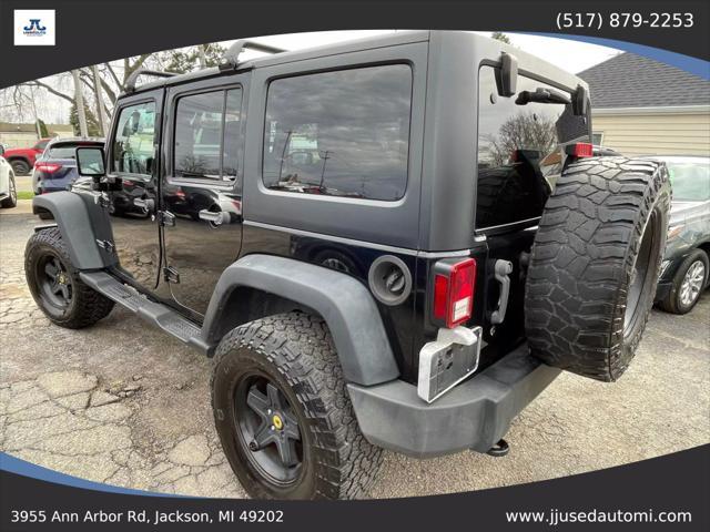 used 2012 Jeep Wrangler Unlimited car, priced at $13,990