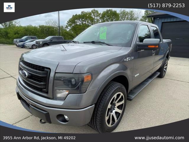used 2014 Ford F-150 car, priced at $15,699