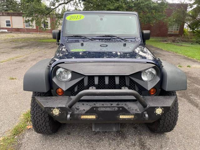 used 2013 Jeep Wrangler Unlimited car, priced at $13,900