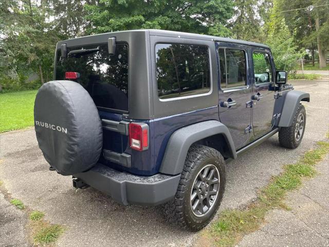 used 2013 Jeep Wrangler Unlimited car, priced at $13,900