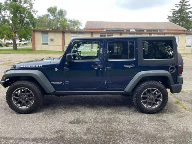 used 2013 Jeep Wrangler Unlimited car, priced at $13,900