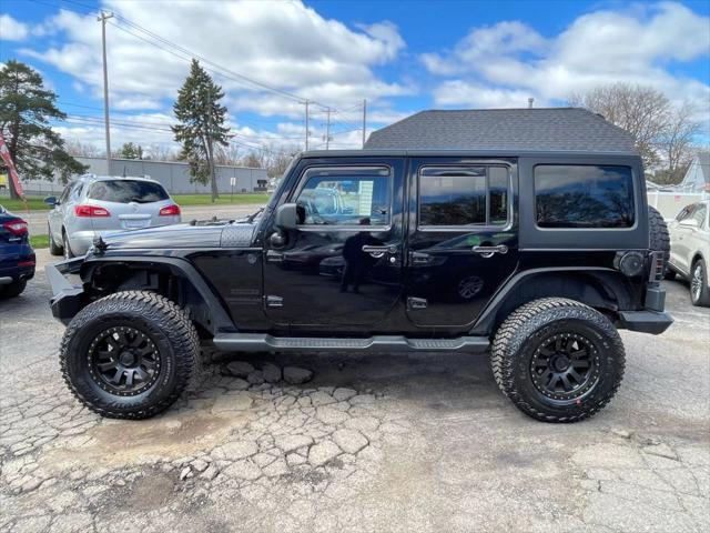 used 2015 Jeep Wrangler Unlimited car, priced at $16,990