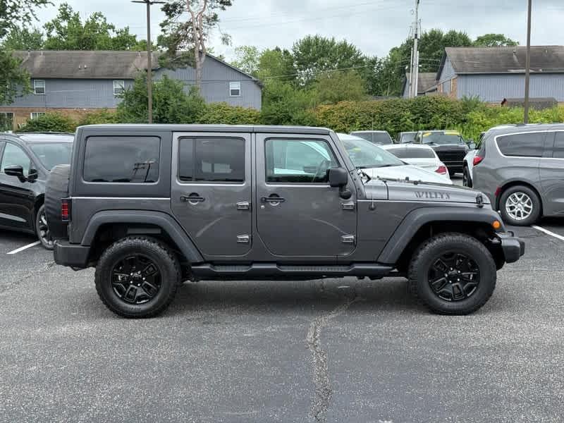 used 2018 Jeep Wrangler JK Unlimited car, priced at $21,998