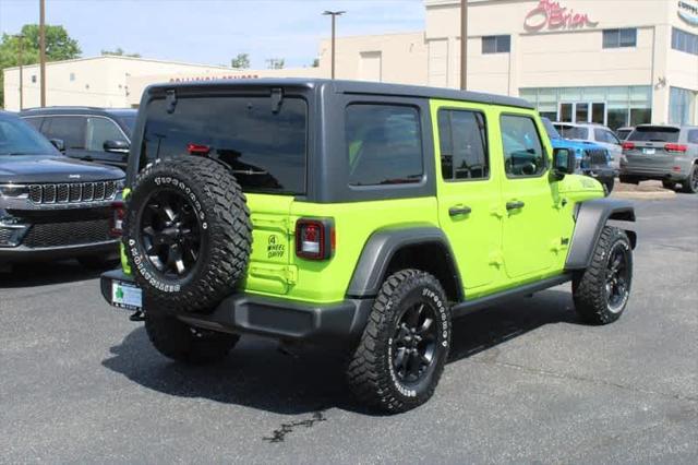 used 2021 Jeep Wrangler Unlimited car, priced at $33,998