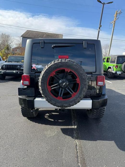 used 2011 Jeep Wrangler Unlimited car, priced at $14,485