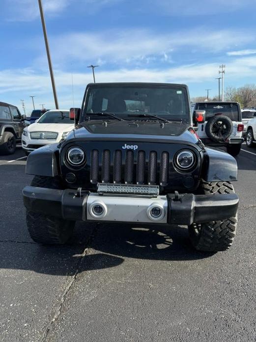 used 2011 Jeep Wrangler Unlimited car, priced at $14,485