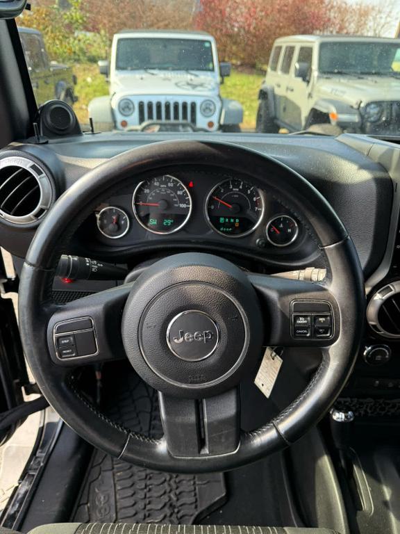 used 2011 Jeep Wrangler Unlimited car, priced at $14,485