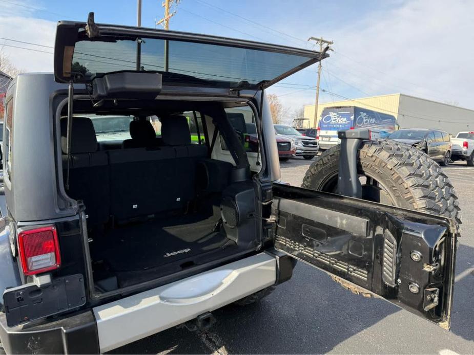 used 2011 Jeep Wrangler Unlimited car, priced at $14,485