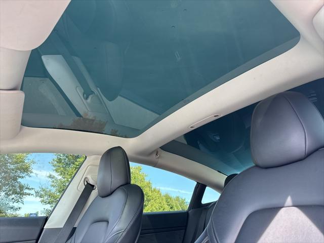 used 2022 Tesla Model 3 car, priced at $20,233