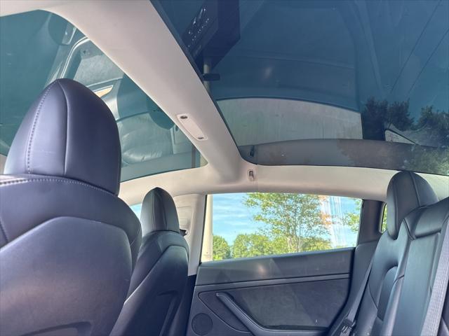 used 2022 Tesla Model 3 car, priced at $20,233