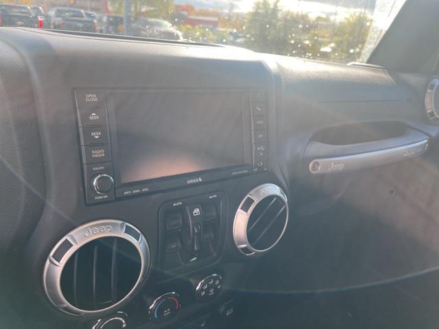 used 2015 Jeep Wrangler Unlimited car, priced at $20,250