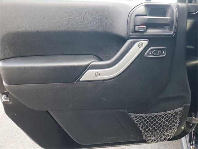 used 2015 Jeep Wrangler Unlimited car, priced at $18,600