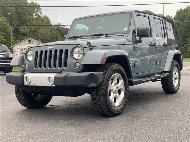 used 2014 Jeep Wrangler Unlimited car, priced at $19,300