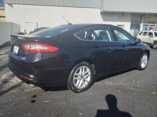 used 2016 Ford Fusion car, priced at $12,100